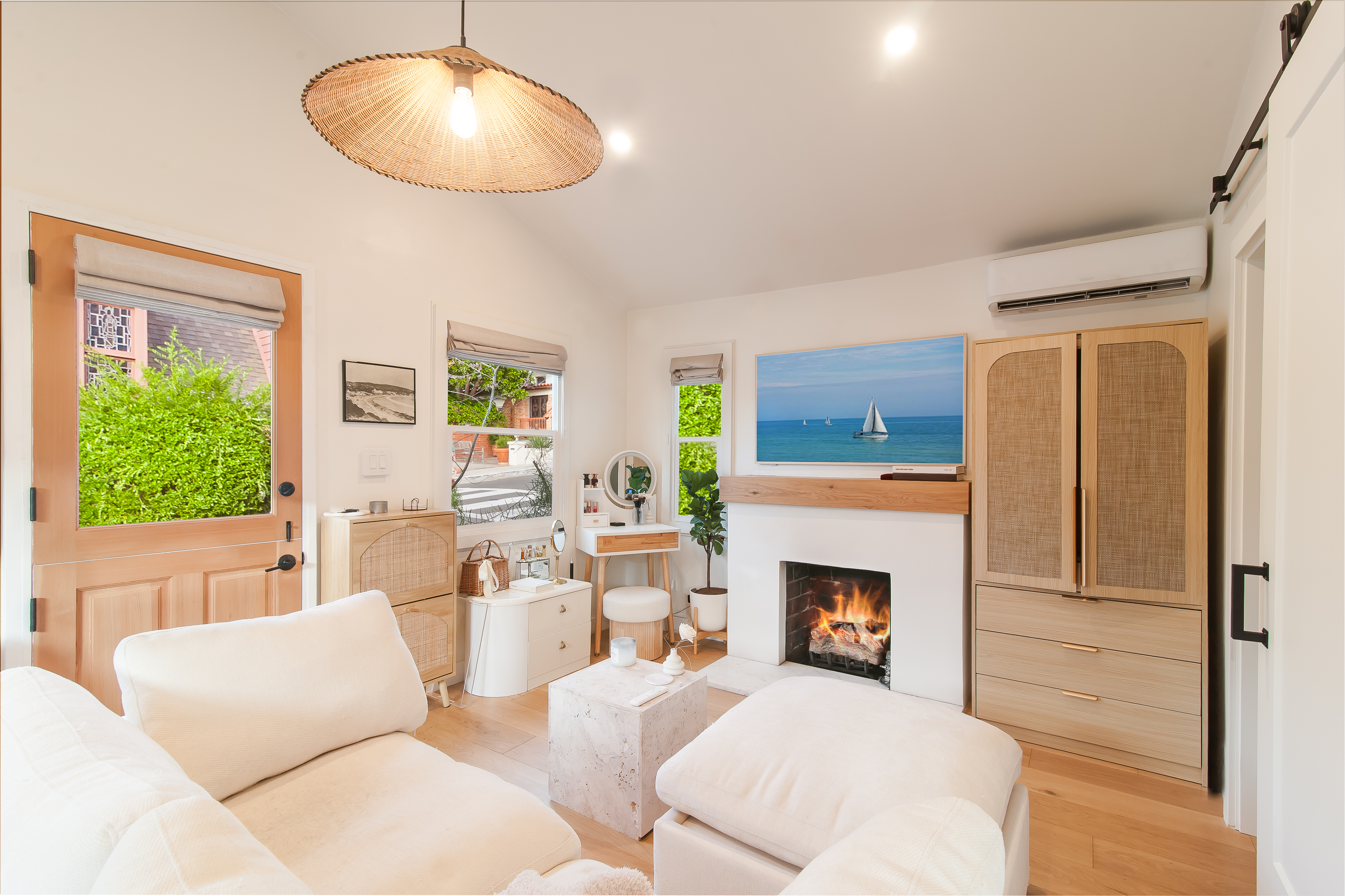 Inviting cottage living space with fireplace and coastal character